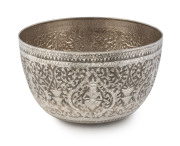 An Asian coin silver bowl, Burmese or possibly Thai, 20th century, ​14cm high, 25cm diameter, 520 grams