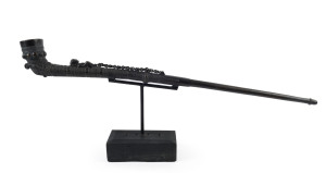 Batak Raja's large bronze tobacco pipe (Tulpang), Toba Batak, Northern Sumatra, Indonesia, 19th century, one of the finest examples seen in our rooms, a similar example can be found in the collection of the Musée du Quai Branly in Paris.