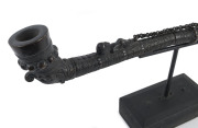 Batak Raja's large bronze tobacco pipe (Tulpang), Toba Batak, Northern Sumatra, Indonesia, 19th century, one of the finest examples seen in our rooms, a similar example can be found in the collection of the Mus&eacute;e du Quai Branly in Paris. - 2