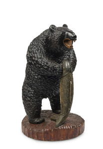 A Black Forest carved bear statue with salmon, early 20th century, 101cm high