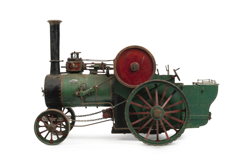 Early 20th century scratch built 2" scale model of an Edward Morgan (Hamiton, New Zealand) steam traction engine built for Hamilton City Council, green livery with gold trim; front wheel diameter 16cm, rear wheel diameter 30cm, length 85cm, width 40cm, he