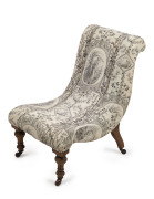A ladies bedroom chair with carved walnut frame, 19th century