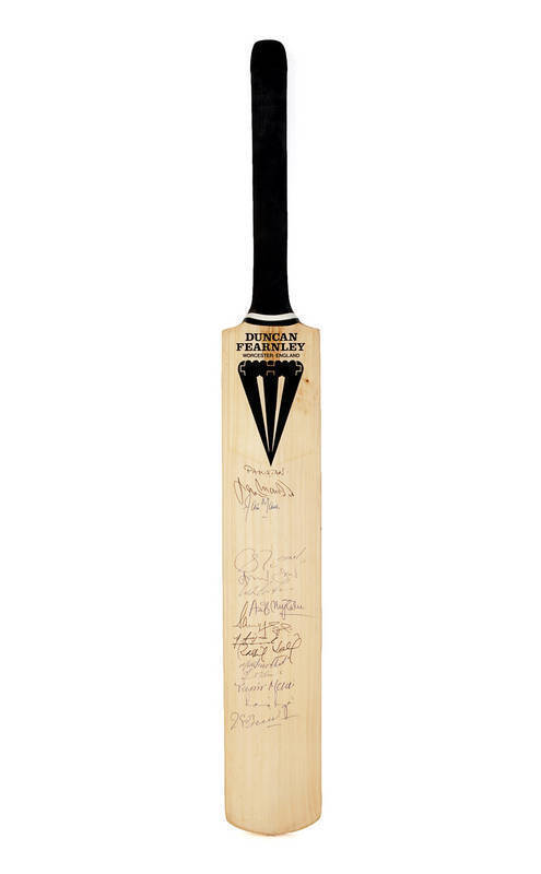 1996 PAKISTAN TEAM: Full size "Duncan Fearnley" cricket bat with 14 signatures on front including Wasim Akram, Inzamam-ul-Haq & Waqar Younis. G/VG condition. With CoA.