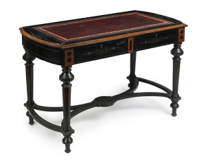 An English writing table, ebonized finish with burgundy leather top, 19th century, 71cm high, 115cm wide, 58cm deep