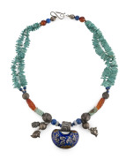A Chinese necklace withe silver and enamel pendant, lapis, jade carved amber and turquoise beads, 19th/20th century, ​68cm long