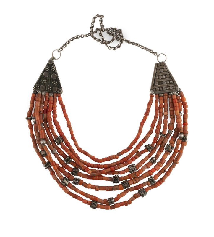 A Tibetan eight strand necklace, silver and coral bead, 19th/20th century, 