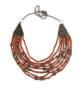 A Tibetan eight strand necklace, silver and coral bead, 19th/20th century,