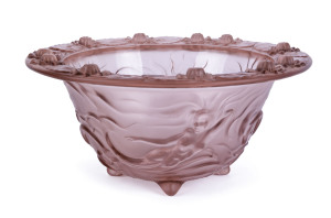 A Bohemian Art Deco pink glass fruit bowl with mermaids and lotus flowers by Josef Inwald Barolac, circa 1930, 15cm high, 31.5cm diameter