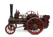 20th Century 3" scale model of Chas. Burrell & Sons Ltd (Thetford, England) steam traction engine. Sturdy metal construction exhibiting quality workmanship, maroon livery with black, red & gold trim; front wheel diameter 27cm, rear wheel diameter 42cm, le