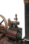 20th Century 3" scale model of Chas. Burrell & Sons Ltd (Thetford, England) steam traction engine. Sturdy metal construction exhibiting quality workmanship, maroon livery with black, red & gold trim; front wheel diameter 27cm, rear wheel diameter 42cm, le - 9