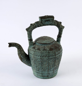An Indonesian ceret bronze tea pot, 19th century, 25cm high