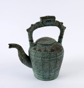 An Indonesian ceret bronze tea pot, 19th century, ​25cm high