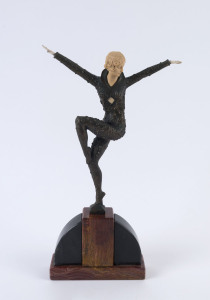 A French Art Deco statue of a dancing woman, cast bronze and ivorine on marble base, circa 1930, 31cm high