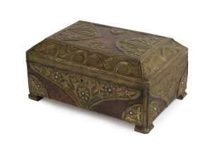 An Arts & Crafts casket, leather and repoussé brass studded with moonstones, circa 1905, interior lined in silk, 17cm high, 37cm wide, 24cm deep