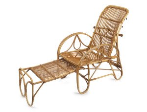 An Italian Art Deco cane sun lounge with pull out footrest and adjustable back, circa 1925,