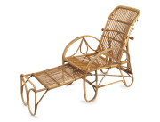 An Italian Art Deco cane sun lounge with pull out footrest and adjustable back, circa 1925,