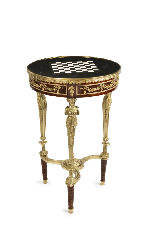 A French gueridon table, black marble, slate and white onyx circular games top with figural gilt bronze legs, in the manner of ADAM WEISWEILER 19th century, 81cm high, 53cm diameter