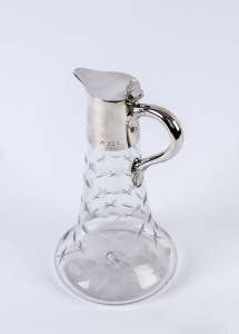 An English claret jug, etched glass with sterling silver top, London, circa 1896, 26cm high
