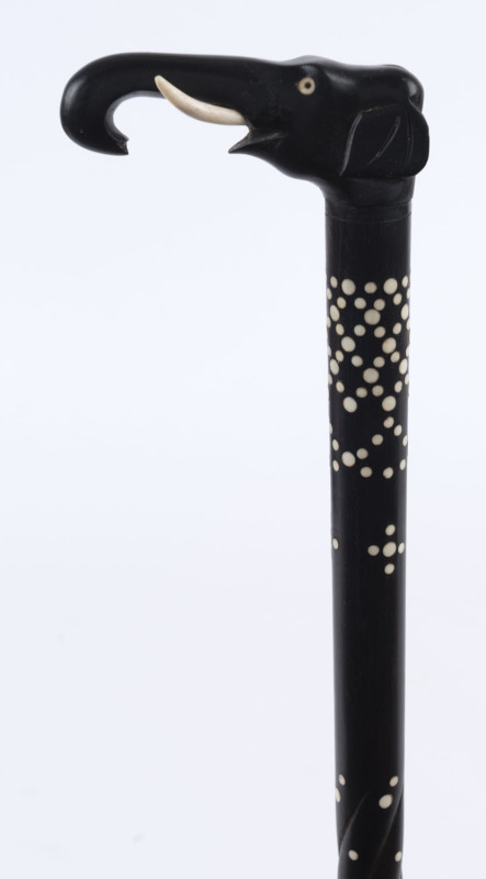 A walking stick with carved ebony elephant head handle and shaft inlaid with bone, 19th century, 89cm high