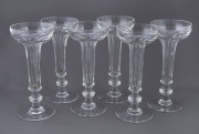 A set of six faceted crystal champagne flutes with hollow stems, most likely Bohemian, early 20th century, ​17cm high