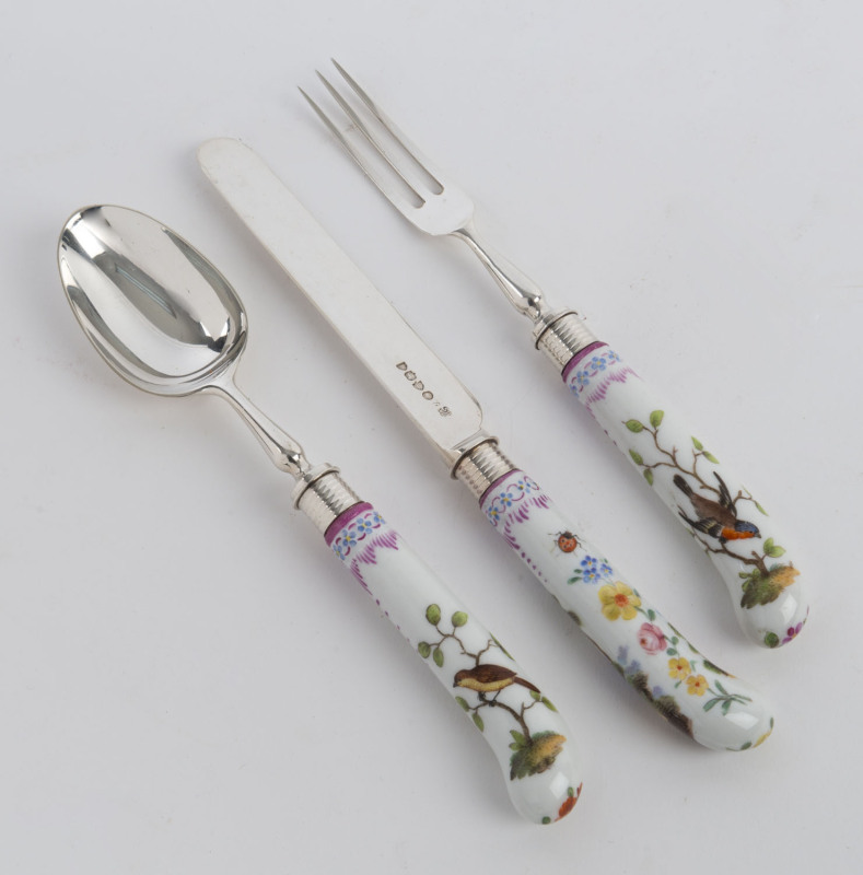 Set of three pieces of English sterling silver cutlery with porcelain handle, made in London, circa 1881, the knife 20cm long