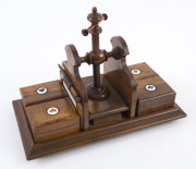 A rare antique Continental treen ware card press with four box compartments, two removable porcelain scoreboards and pencils, plus antique cards, 19th century, ​22cm high,29cm wide, 15cm deep