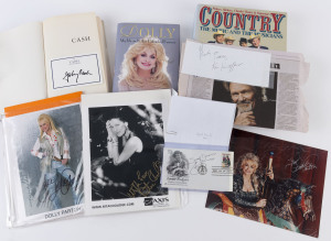 AMERICAN "COUNTRY" MUSIC - BOOKS AND AUTOGRAPHS: comprising hardbound large format "Country - The Music and the Musicians" (Country Music Foundation, 1988) with Dolly Parton large signed colour photo (20 x 25cm), Rita Coolidge large signed black & white p