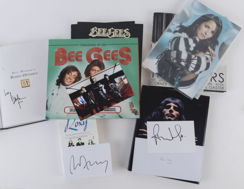 BRITISH 1960s-2000s "POP" BANDS OR BAND MEMBERS - BOOK AND AUTOGRAPHS: comprising The Corrs "Corner to Corner" by Paul Gaster (1999) with signed colour photo (30 x 20cm) of Andrea Corr, Bill Wyman (Rolling Stones) "Blue Odyssey" (2001) signed by Wyman on