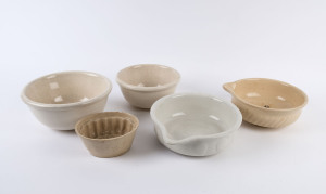 KITCHENALIA: Four ceramic mixing bowls and a jelly mould, 19th and early 20th century, (5 items), ​the largest bowl 30cm wide