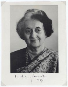 INDIRA GANDHI: autograph on black & white photograph (19.5 x 15cm) signed "Indira Gandhi 1983", another signature on 1973 Gandhi and Nehru (Indira Gandhi's father) commemorative first day cover, plus Rajiv Gandhi (Indira's son and successor) signature on 