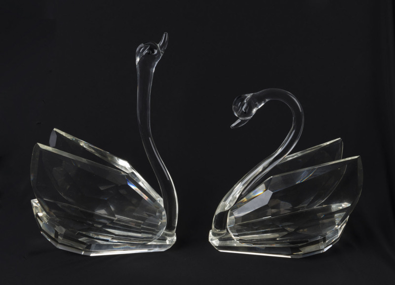 A pair of crystal swan ornaments, 20th century, ​the largest 34cm high