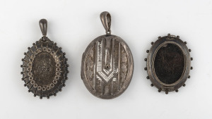 Two antique silver lockets and a brooch (missing pin), 19th century, (3 items), the largest 6cm high,