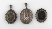 Two antique silver lockets and a brooch (missing pin), 19th century, (3 items), the largest 6cm high,