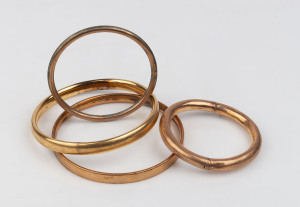 Four antique bangles, hollow gold, gold filled, rolled gold and gold plated, 19th and early 20th century, 