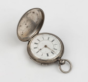 A sterling silver cased gents pocket watch with chronograph split seconds function, movement marked "Ehrhardt, London", 19th century, engraved inside the case "METROPOLITAN ARTILLERY Annual Rifle Trophy Won By Captain W. KELLY, 1882", 7cm high overall