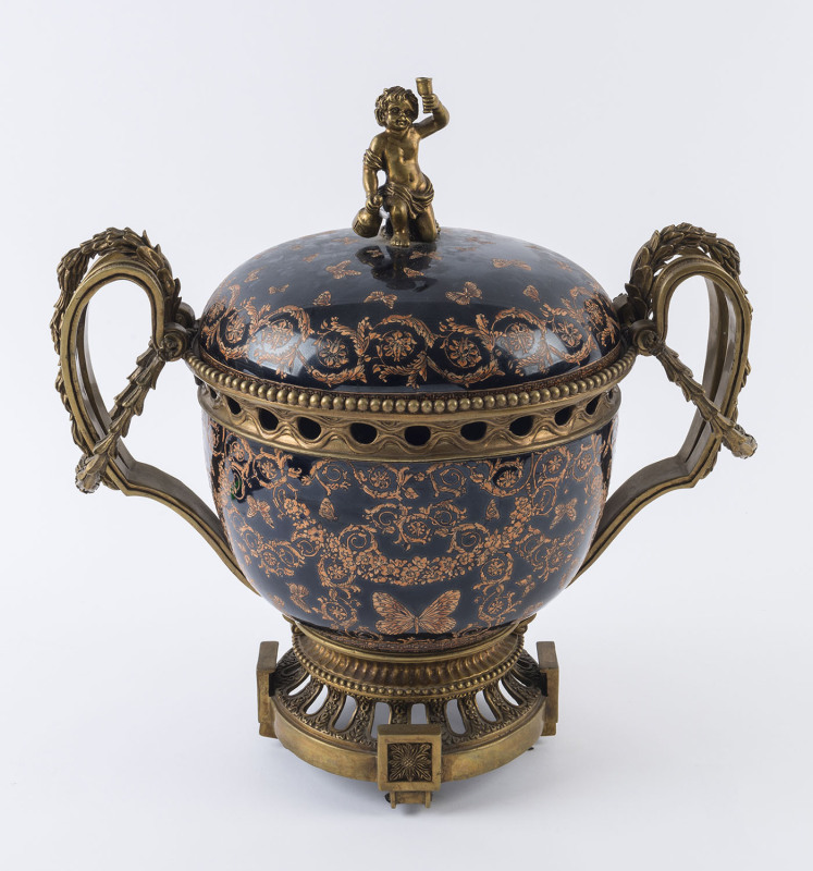 A French mantel urn, porcelain and bronze, 20th century, 47cm high