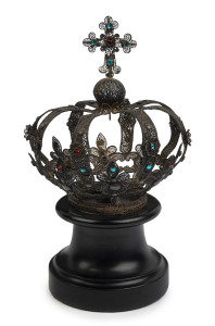 Antique French "Infant Of Prague" silver filigree crown with rhinestones, 19th century, later wooden plinth, 25cm high overall