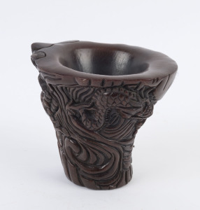 A Chinese carved horn libation cup, Kangxi mark, 19th/20th century, 14.5cm high