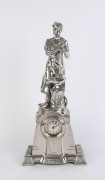 "INDUSTRY" German figural mantel clock, finely cast metal with silver plated finish, early 20th century, 57cm high