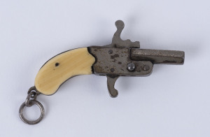 An antique Austrian fob miniature pistol with bone hand grips, 19th century, 5cm long