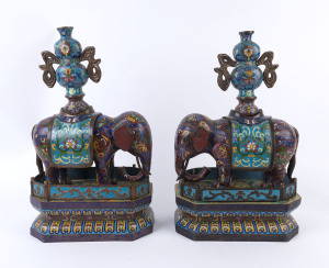 A pair of Chinese cloisonne and copper elephant statues, 19th/20th century, 55cm high