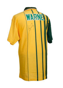 SHANE WARNE, nice signature on Australian One-Day shirt, with "WARNE" on reverse.