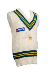 WASIM AKRAM'S PAKISTAN JUMPER, sleeveless, with embroidered Pakistan logo & sponsor's badge on front, signed on front by Wasim Akram. G/VG condition. [Wasim Akram played 104 Tests & 356 ODIs 1984-2003].