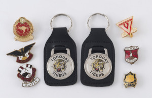 TASMANIAN AUSTRALIAN NATIONAL FOOTBALL LEAGUE/TASMANIAN FOOTBALL LEAGUE: pin badges selection comprising Hobart FC ("The Tigers") 1958 membership badge, New Norfolk DFC ("The Eagles") 1962 membership & 1981 player badges, plus Clarence District FC ("The Roos") 1963, 1975 & 1983 membership badges; also two Torquay Tigers key fobs. (8 items)