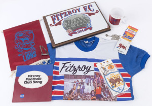 FITZROY - CLUB MEMORABILIA: Mid-1970s era array incl. supporter's tee shirt size 14, Football Club Song by 45rpm record by "The Fable Singers", "The Mighty Lions" pennant, Bar Mirror showing 1904 Premiership team, Scanlens club mascot sticker, necklace pendant, beaker, club embroidered emblem (original packaging) & AFL Centenary stamp booklet; condition variable.