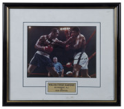 MUHAMMAD ALI v KEN NORTON, both signatures on action photograph, window mounted, framed & glazed, overall 43x39cm.