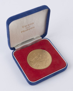 c.1960 Victorian Football League gilt medal, unengraved on reverse, 50mm diameter, weight 55.20gr, in original Swann and Hudson presentation case.