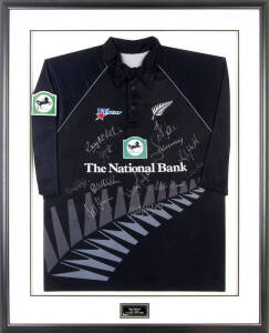 2004 NEW ZEALAND TEAM, Jacob Oram's NZ One Day shirt with 12 signatures including Stephen Fleming, Chris Cairns, Craig McMillan & Daniel Vettori, window mounted with plaque "New Zealand, ODI Team, Wellington 20/2/2004", framed (not glazed) overall 87x108c