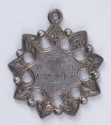 1878-79 Royal Oak Hotel Cricket Club medal awarded to W.Burke  for "All Round Play"; crossed bat and wicket on reverse.