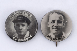 DONALD BRADMAN: two vintage monochrome Bradman pin badges, one headed "AUSTRALIAN XI' the other showing a smiling Bradman, each 2cm diameter. Scarce. (2)